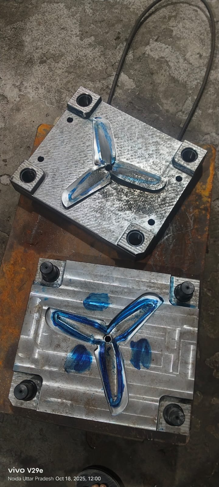 Two halves of the propeller injection mold